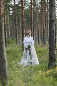 Senior woman in forest