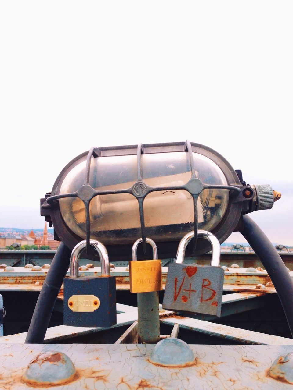 transportation, clear sky, mode of transport, sea, metal, nautical vessel, land vehicle, copy space, close-up, day, coin-operated binoculars, sky, outdoors, travel, water, no people, stationary, boat, focus on foreground, railing