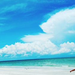 Scenic view of sea against cloudy sky