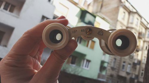 Close-up of hand holding text