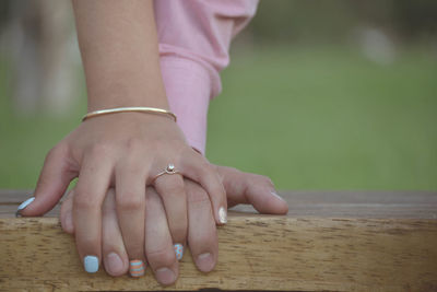 Close-up of couple hands