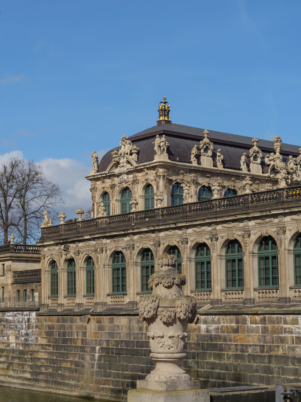 architecture, landmark, built structure, building exterior, sky, travel destinations, palace, history, the past, ancient history, nature, travel, city, ancient, tourism, day, no people, sculpture, building, blue, clear sky, facade, tree, outdoors, statue, arts culture and entertainment, monument, low angle view, architectural column