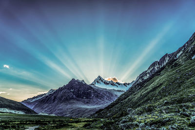 Scenic view of mountains against sky during winter