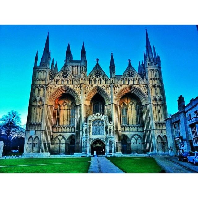 architecture, building exterior, built structure, transfer print, church, place of worship, clear sky, blue, facade, religion, dome, arch, auto post production filter, cathedral, spirituality, lawn, famous place, history