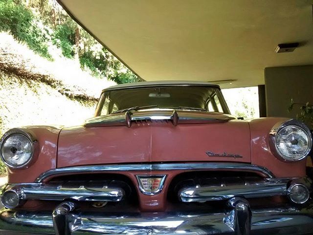 VINTAGE CAR PARKED ON ROAD