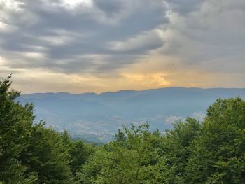 Scenic view of mountains against sky during sunset