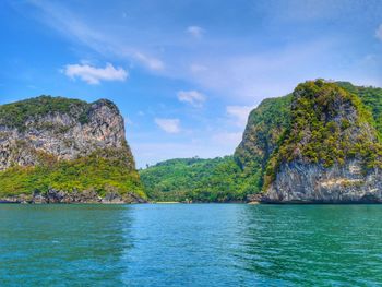 Scenic view of sea and rocks against sky