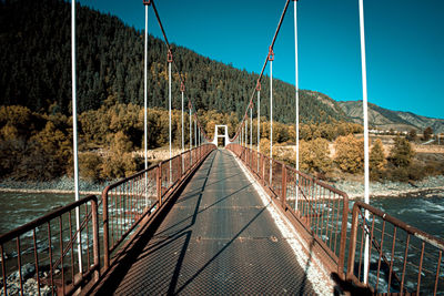 Bridge over river against sky