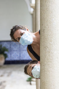 Mother and son with face masks