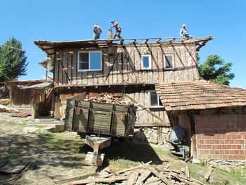 Low angle view of old building against sky