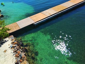 High angle view of swimming pool by sea