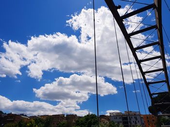 Low angle view of buildings against blue sky