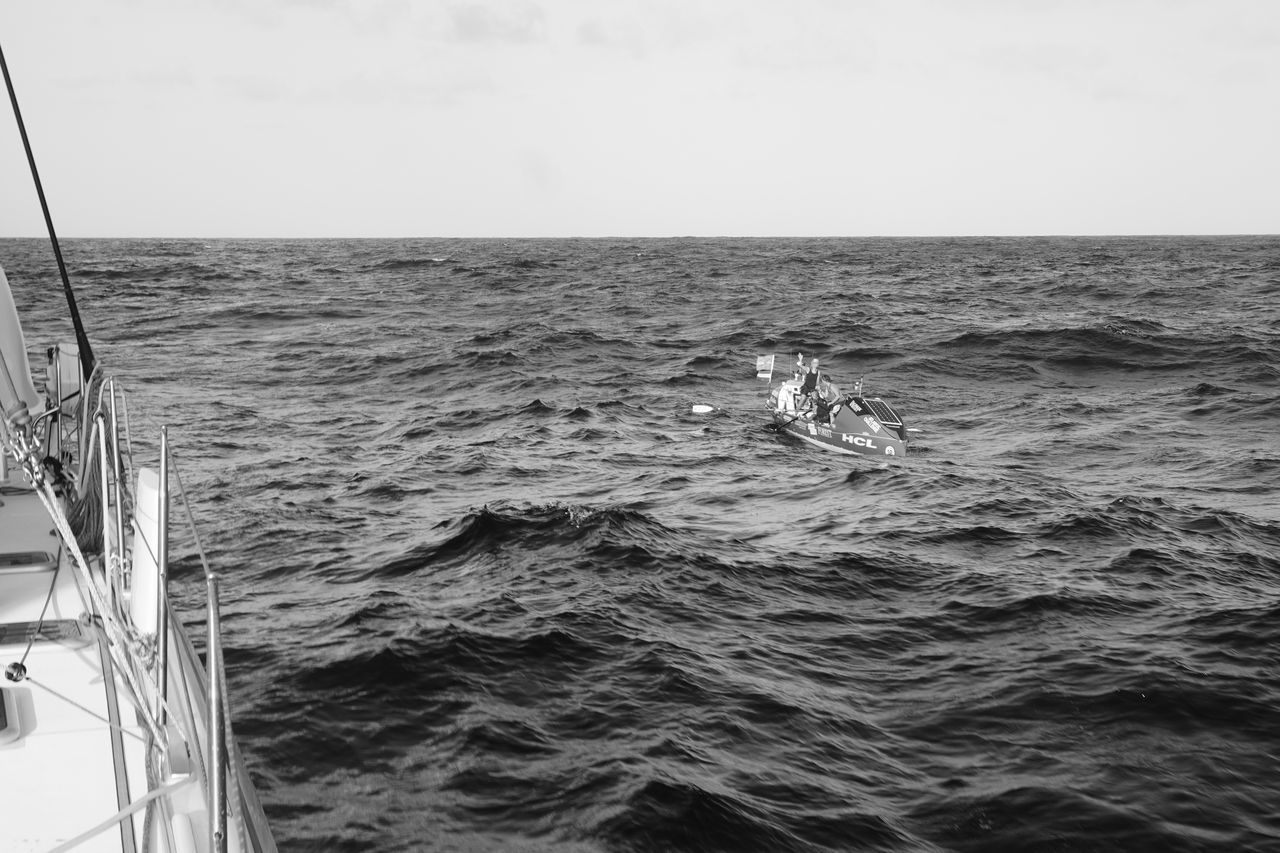 SAILBOAT IN SEA AGAINST SKY