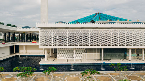 View of swimming pool against building