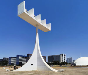 Low angle view of building against blue sky