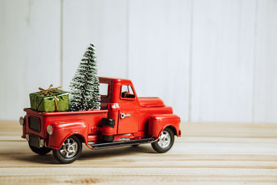 Close-up of toy car on christmas tree