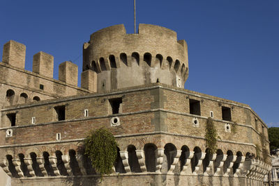 Low angle view of historic building against sky