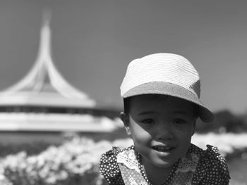 Portrait of smiling cute girl wearing cap