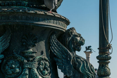 Low angle view of statue against clear sky