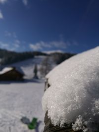 Close-up of snow against sky