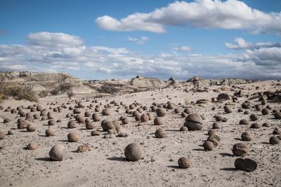 Panoramic shot of rocks on land against sky