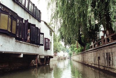 River amidst buildings in city