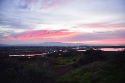 High angle view of houses against sky during sunset