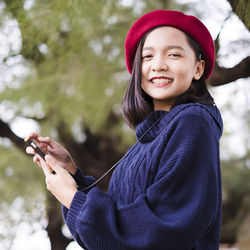 Portrait of a smiling woman in winter