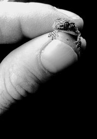 Close-up of woman with tattoo on hand