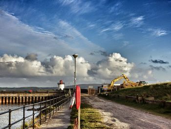 Road against cloudy sky