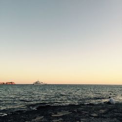 Scenic view of sea against clear sky