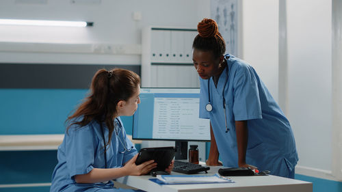 Nurses having discussion in clinic