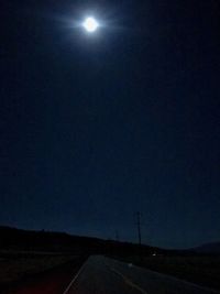 Scenic view of moon against sky at night