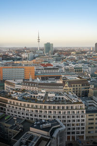 Cityscape against clear sky