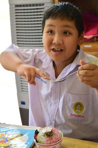 Close-up of boy eating food