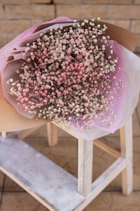 High angle view of pink roses on table