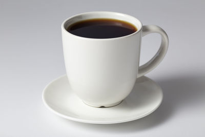 Close-up of coffee cup on table