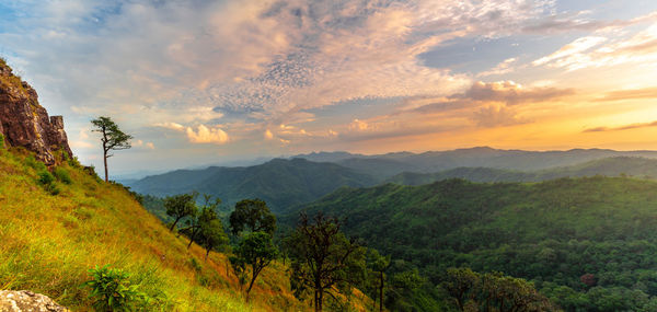 Scenic view of mountains against sky during sunset