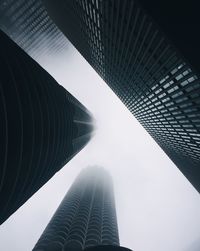 Low angle view of skyscrapers against sky