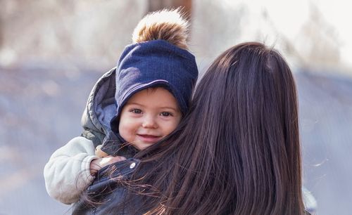 Portrait of mother and daughter in winter