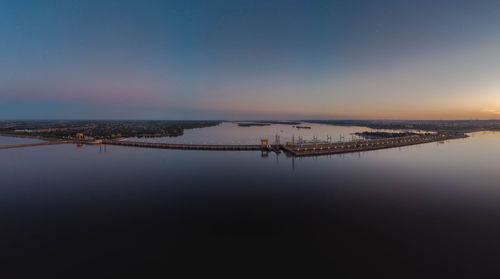 Scenic view of sea against sky at sunset