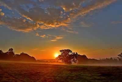 Scenic view of sunset over landscape