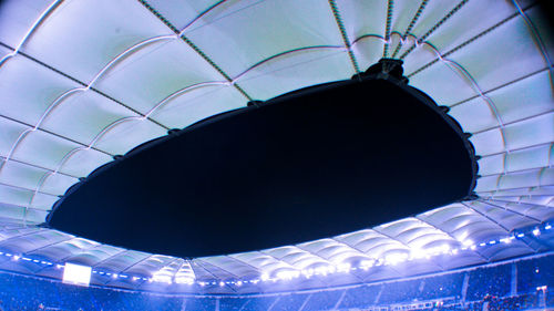 Low angle view of illuminated ceiling