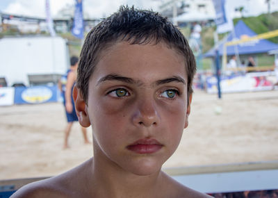 Close-up of boy at beach