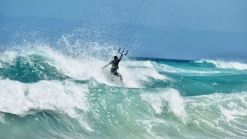 Man surfing in sea