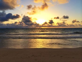 Scenic view of sea at sunset