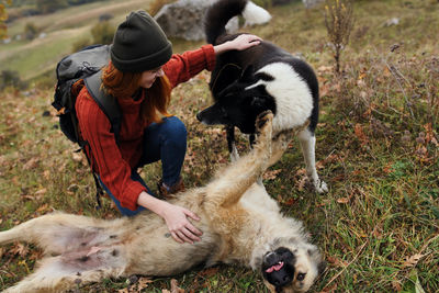 Man with dog on field