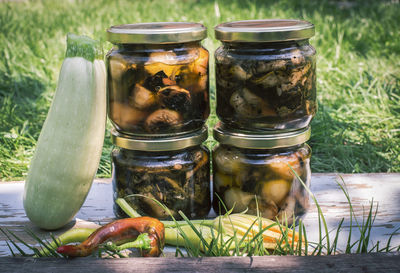 Close-up of drink in glass jar on table