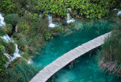 High angle view of boardwalk over river