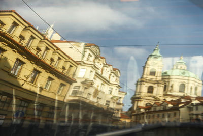 Low angle view of cathedral against cloudy sky